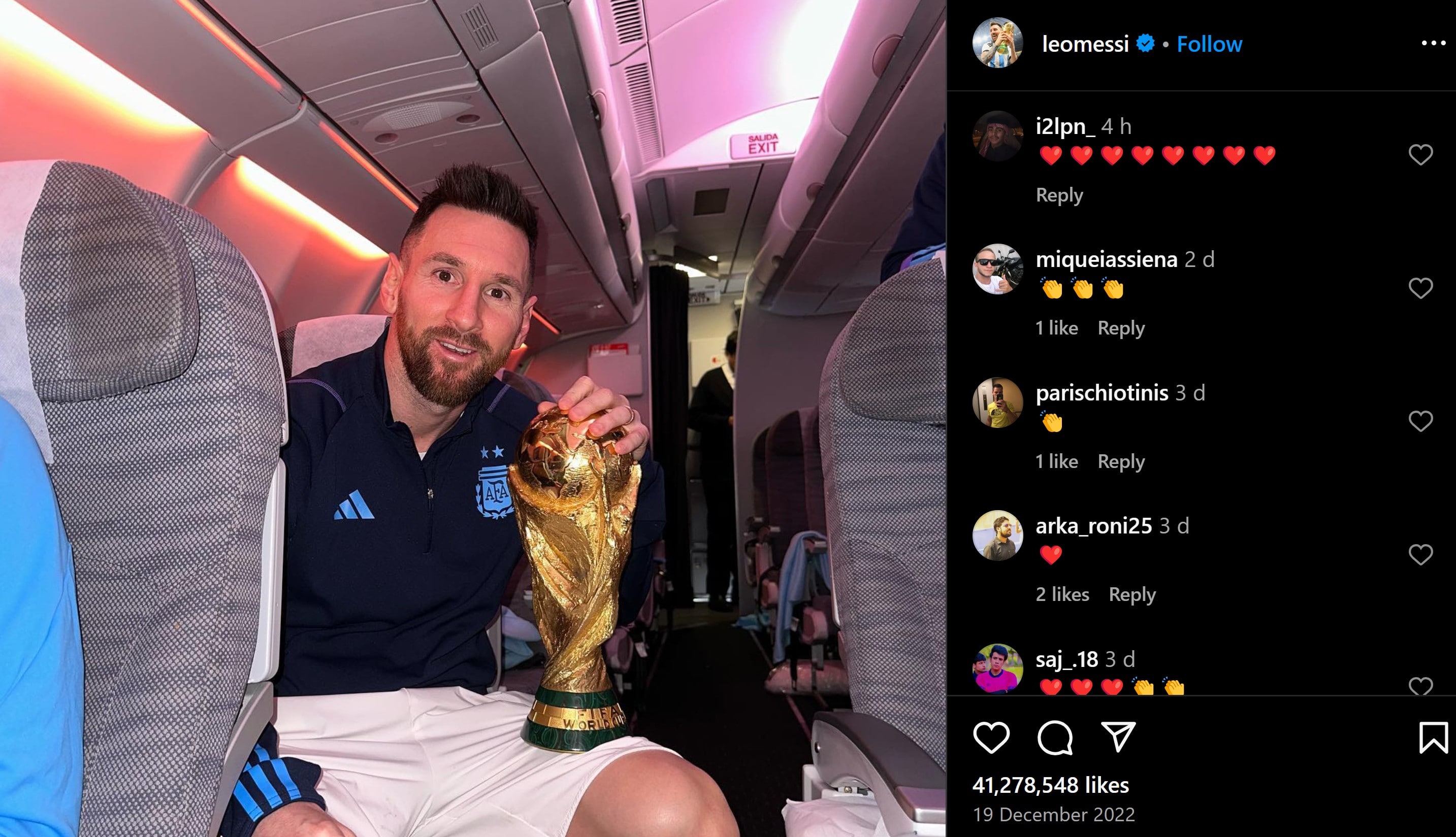 Messi on the plane with his World Cup trophy (2022)