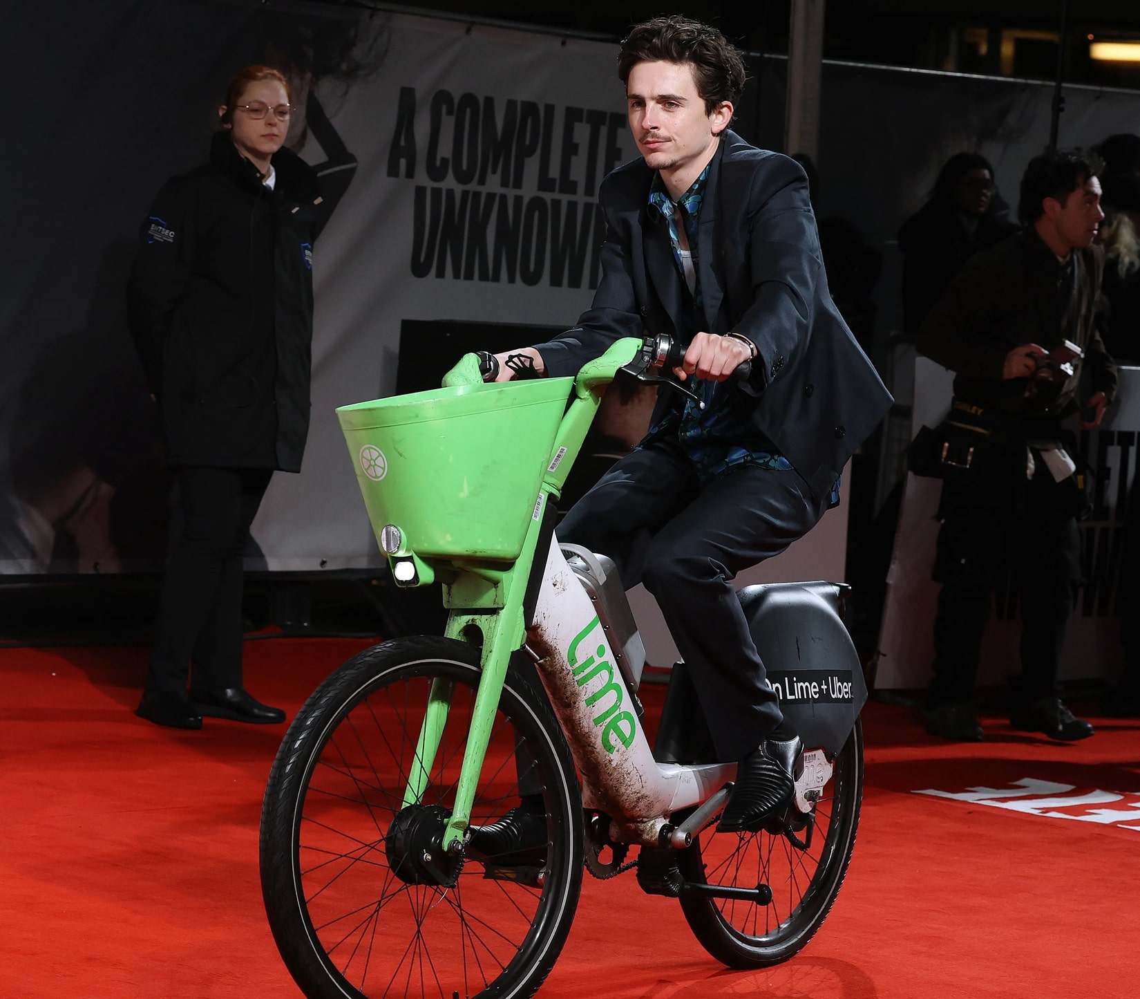 Timothée Chalamet rides a Lime bike to London premiere